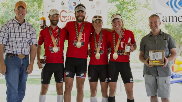 Participants posing with medals